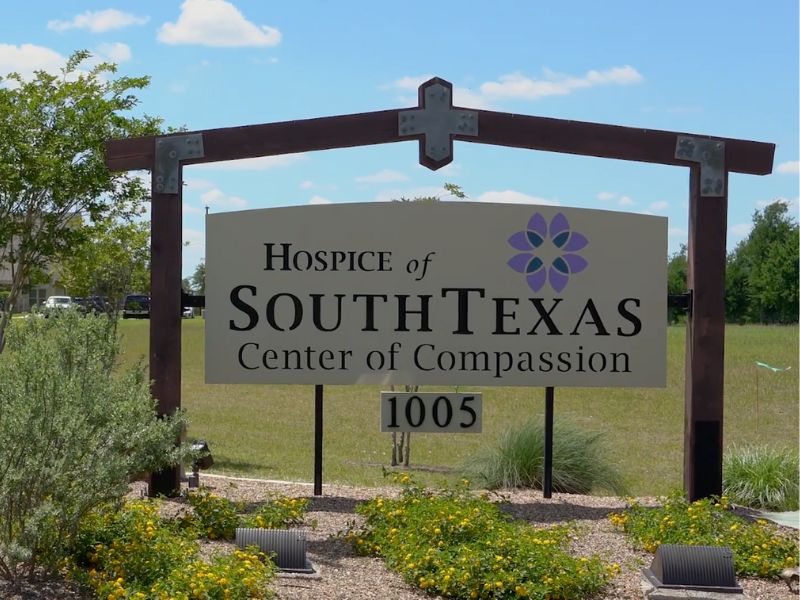 Sign for Hospice of South Texas Center of Compassion with address 1005.